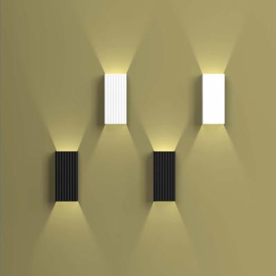 China Lámpara de pared LED de aluminio negro blanco moderno nórdico para dormitorio en venta