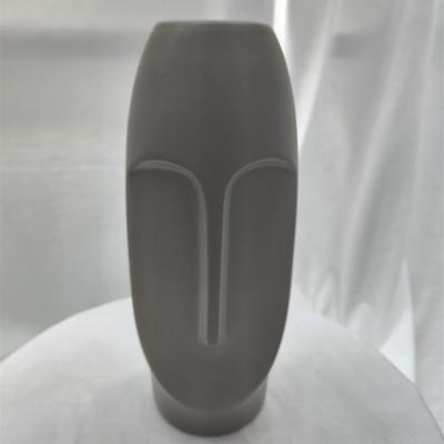 China Newest Nordic Creative Face Decor Niche Minimalist Home Decor Cheap Sale Handmade Ceramic Vase for sale