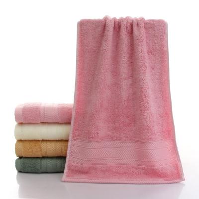 China 32s/2 30 cotton 70 bamboo charcoal fiber good quality ex-stock available wholesale face hand towel customized label for sale