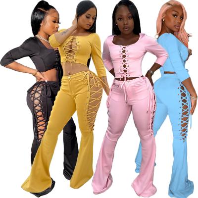 China Anti-pilling anti-pilling latest casual design 2021 drop off shoulder solid crop top leisure 2 pieces set women stacked pants set two piece set for sale