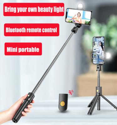 China Selfie Stick with Tripod Multifunctional 360 Degrees Rotating Wireless Tripod Selfie Stick with Tripod for Mobile Phone for sale