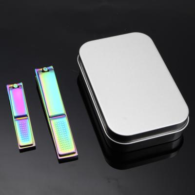 China Titanium Inveterate Thick Cutters Kit Manicure Nail Clippers Premium Rainbow Nail Care Kit Smooth Metal Cutter Tin Case for sale