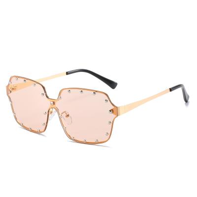 China Europea&America personality fashion sunglasses36003 border sunglasses new rivet women's frameless one-piece sunglasses for sale