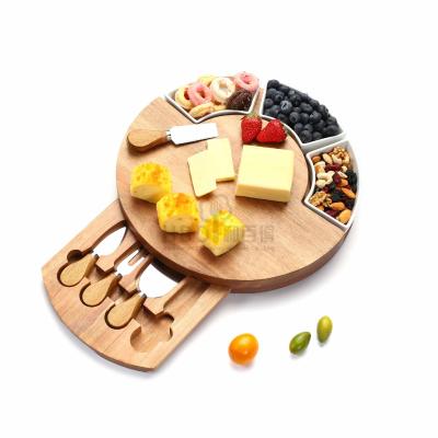 China Sustainable Bamboo Kitchen Round Cutlery Set Drawer Acacia Wood Cheese Board Ceramic Set for sale