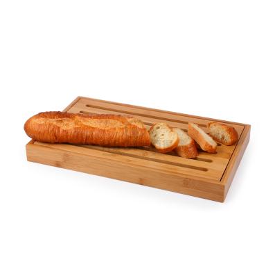 China Natural Kitchen Tool Customization Bread Stocked Bamboo Cutting Board With Crumb Tray for sale