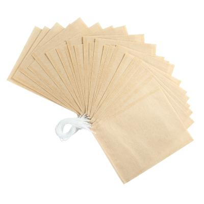 China Different Food Wooden Tea Bags Pulp Empty Biodegradable Drawstring Filter Bag With Strings for sale