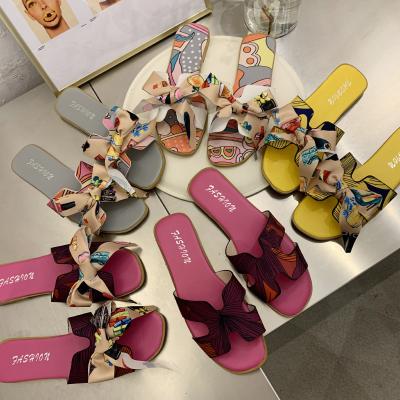 China Fashion trend 2021 new summer style woman sandals bow shape flat beach sandal slippers for sale