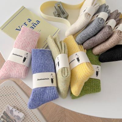 China Autumn QUICK DRY winter thermal cashmere knitted thick woolen socks women fashion bright color warm wool thongs women for sale