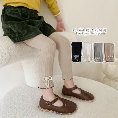 China Korean fashion anti-pilling pearl bow baby tights cotton fancy solid color ruffle cute baby kids gaiters wholesale for sale