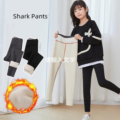 China Comfortable Warm Girls Fuzzy Children Shark Pants Solid Color Warm Fluffy Cashmere Fade Proof Winter Thermal Thick for sale