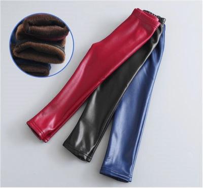 China Fade Proof Hot Sale Winter Thick Fleece Chevrotin Color Pantyhose Shape PU Fuzzy Warm Kids Leather Solid Color Imitation Leggings for sale