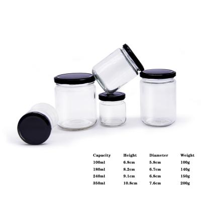 China Transparent Food Storage 32Oz 16Oz 8Oz 4Oz 2Oz 1Oz Cylinder Storage Honey Glass Jars With Screw Caps for sale