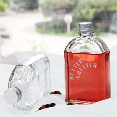 China Eco-Friendly Custom Spirits Alcohol Whiskey Liquor Clear Flat Flask Square Logo Glass Bottle for sale