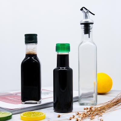 China High Quality Environmentally Friendly Lead Free Round Cooking Oil Vinegar Packaging Food Grade Glass Bottle for sale