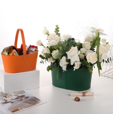 China Handmade Luxury Logo Bouquet Packaging Cardboard Boxes Leather Flower Box Rose Gift Packaging Bucket Flower Paper Box With Handle for sale