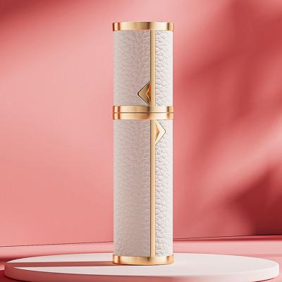 China 5m Travel High-end Custom Atomizer Cosmetic Perfume Bottom Refillable Golden Genuine Leather For Personal Care for sale