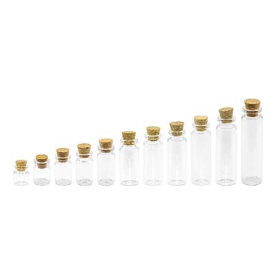 China Gift & Craft Small Empty Diaphanous Glass Jars With Corks Mini Information Aspirations Bottles Cosmetics Perfume Craft Vials for sale