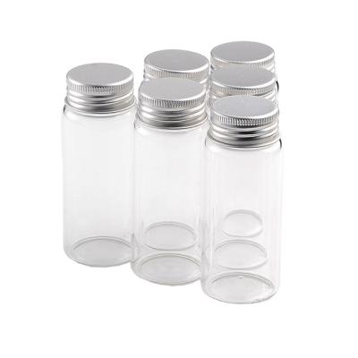 China 65ml gift glass bottles with silver screw cover, transparent bottle can hold items, customized logo, mass sale and free of freight for sale