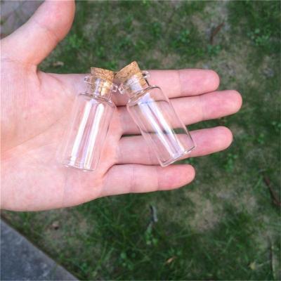 China Gift 13 Mini Glass Bottle With Corks Empty Transparent Tiny Bottles Wholesale Clear Jar Vials Wholesale for sale