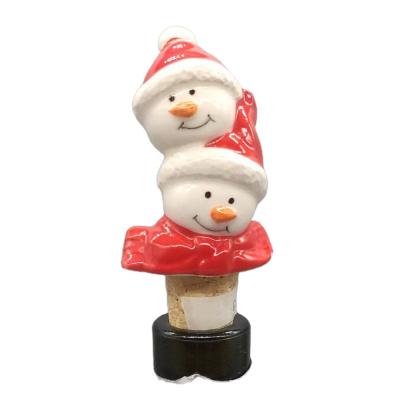 China Christmas Snowman Design Christmas Snowman Shape Ceramic Wine Bottle Stopper Wine Cork For Chrismas Party for sale