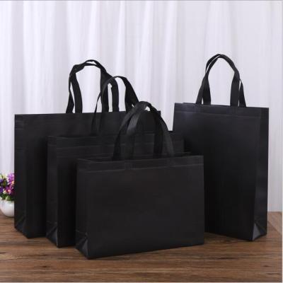 China Lightweight/eco/cheap ready to ship Multi Size Black PP Tote Party Favor Goodies Gift Non Woven Reusable Christmas Wedding Gift Bags for sale