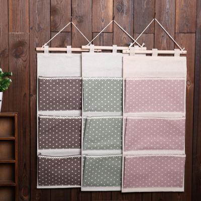 China Over Door Canvas Hanging Wall Cloth Cotton Cloth Storage Bag 3 Pockets Over Door Organizer For Room Bathroom for sale