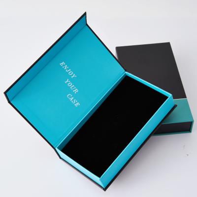 China Custom Luxury Magnetic Flip Mobile Phone Box Closure Paper Packaging Gift Box Phone Foam for sale