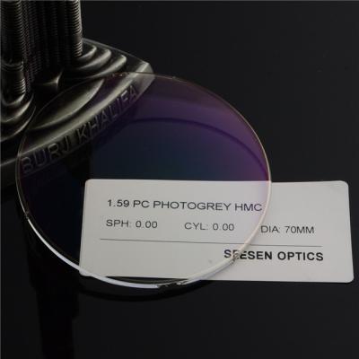 China 1.59 Rotation Photochromic Polycarbonate HMC Goggles Transition Eyeglass Photochromic Lenses for sale