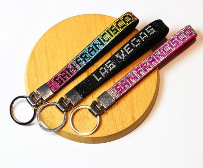 China Wholesale fashion key chain polyester key chain lanyard and rhinestone crystal bracelet. Key chain with custom name for sale