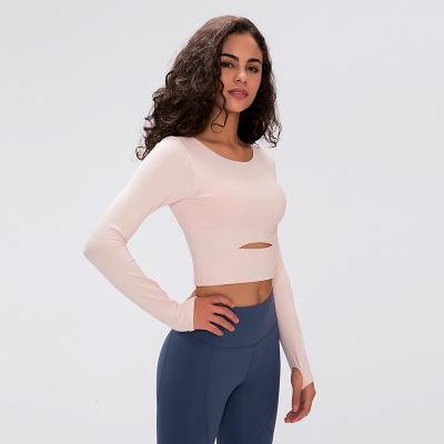 China Breathable Crop Long Sleeve Yoga Suit Hollow Out Breast Pad Stylish Women Fitness Shirt Yoga Sportwear Gym Casual Clothing for sale