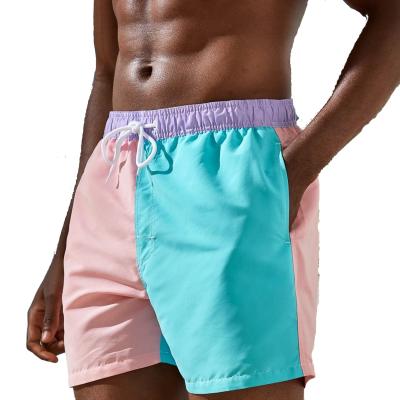 China 2021 Wholesale Custom Graphic Logo Mens Stitching Multicolor Piece Anti-Wrinkle Graphic Swimwear Nylon Oversized Shorts for sale