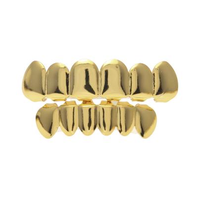 China Factory Selling FASHIONABLE Hot Hip Hop Tooth Real Gold Plated Brass Teeth Grillz for sale