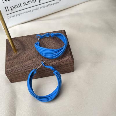 China Fashion Geometric Winding Joker Earrings TRENDY Blue Skinny White Earrings Small Earrings for sale