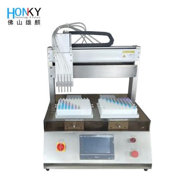 China High Speed Parfums Tube Sample Filling Machine 2ml Tube Filling Machine met hoge precisie Filling Pump voor Parfums Te koop