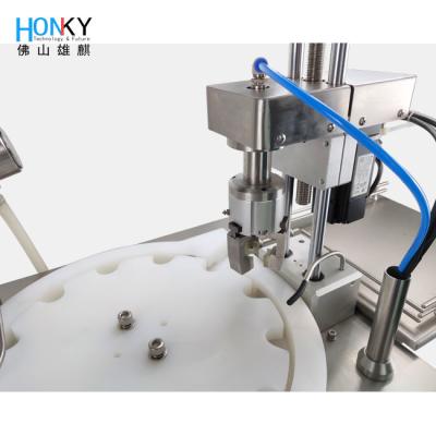 China Desktop Essential Automatic Filling And Capping Machine With Servo Motor Capping System For Glass Bottle Packing zu verkaufen