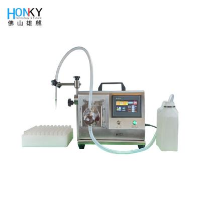 China Bio Reagent Ceramic Pump Desktop Filling Machine For Rapid Test Kit for sale