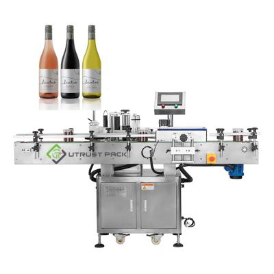 China Food Round Bottle Bilateral Self Adhesive Labeling Machine High Speed ​​Automatic Wine Bottle Labeler for sale