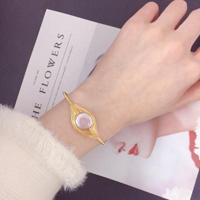 China Haiyang Graceful Gold Men's Women's Fashion Design Pearl Bracelet Female Charm With Wholesale Price for sale