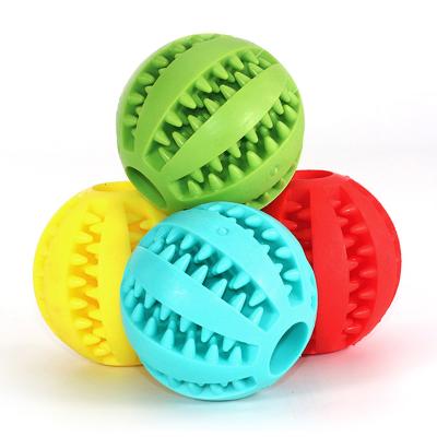 China Sustainable Cleaning Teeth Grinding Natural Rubber Pet Chew Ball Treat Food Dog Toy Durable for sale