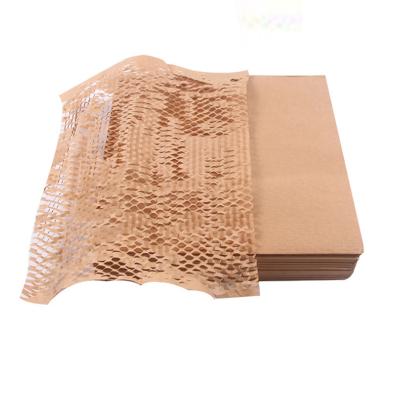 China 2021 New Transportation Filling Biodegrade Honeycomb Kraft Paper Process Shockproof Damping Packaging Packing And Rolling Damping For Shock Resistance for sale