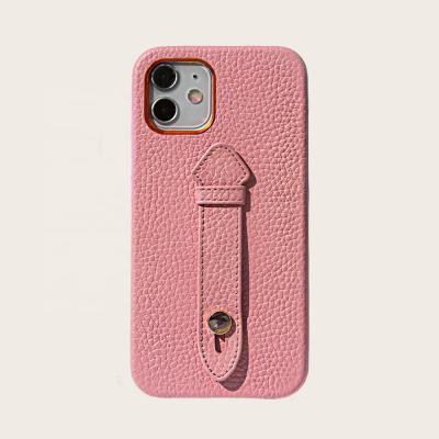 China Luxury full grain lychee back cover maker fashion cell phone leather case with strap for iphone 12 pro for iphone 12/12 pro for sale