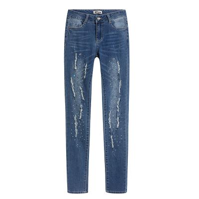 China Breathable Fashion Diamond Inlaid Scratch Design Shows Slightly Pants Denim Pants for sale