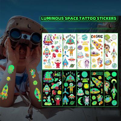 China Temporary Cartoon Space Nightlight Tattoo Sticker Waterproof luminous temporary tattoos stickers for Children for sale