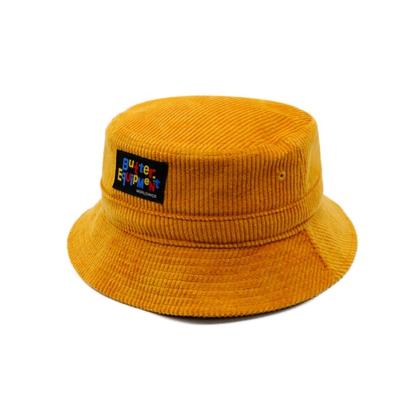 China Newly Disigner JOINT Solid Color Custom Bucket Hat Corduroy Fisherman Hat With Woven Patch for sale