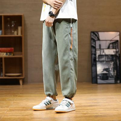 China Anti-Wrinkle Casual Pants Men's Drawstring Gaiters Loose Straight Pants For Teenagers Jumpsuits Fashions Sweatpants for sale