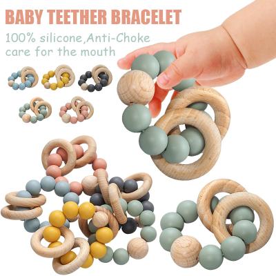 China BPA Free Baby Nursing Bracelets Toys Gift Wood Ratchets Silicone Teether for sale