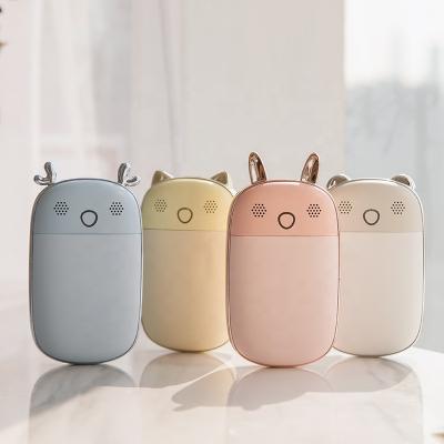 China Hotel High Capacity 10000mAh Battery Mini Portable Hand Warmer Power Bank USB Rechargeable Pocket Hand Heater for sale