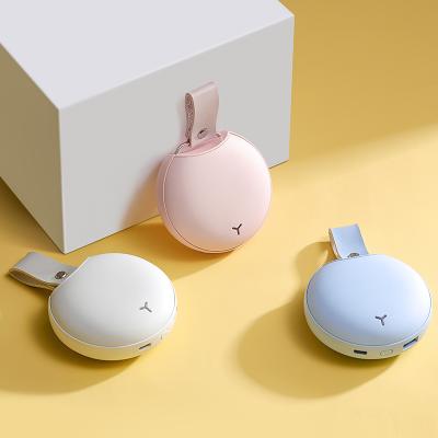 China Hotel Pocket Hand Warmer Hot Selling USB Rechargeable Portable Power Bank Mini Electric Cute Hand Warmer for sale