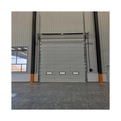 China Good quality waterproof industrial vertical overhead warehouse lifting sectional door for sale