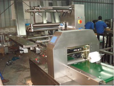 China High Efficiency Flow Wrap Packaging Machine With Human Machine Interface for sale